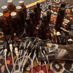 Assorted Glass Bottles and Spray Nozzles